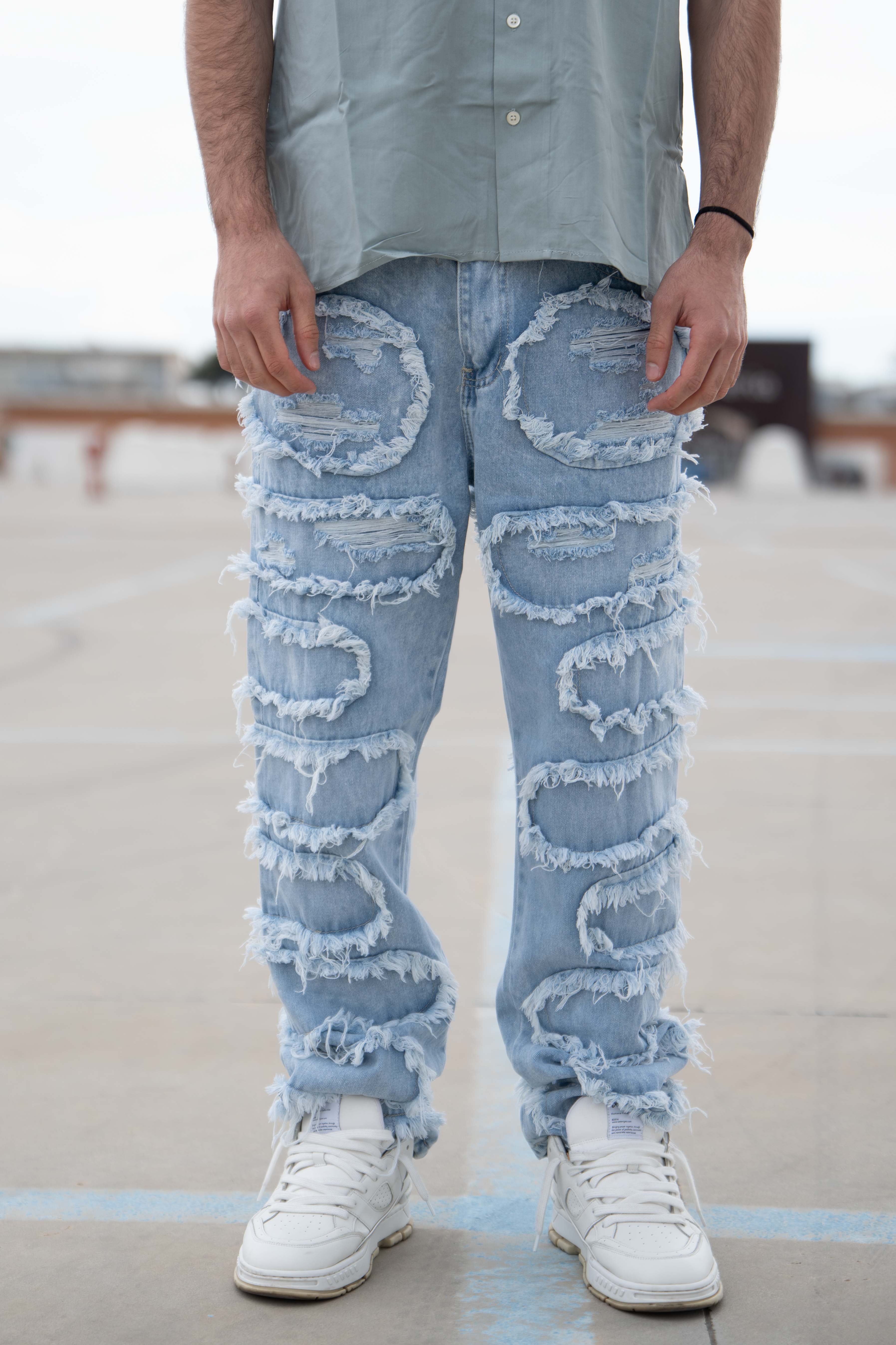 Jeans con frange