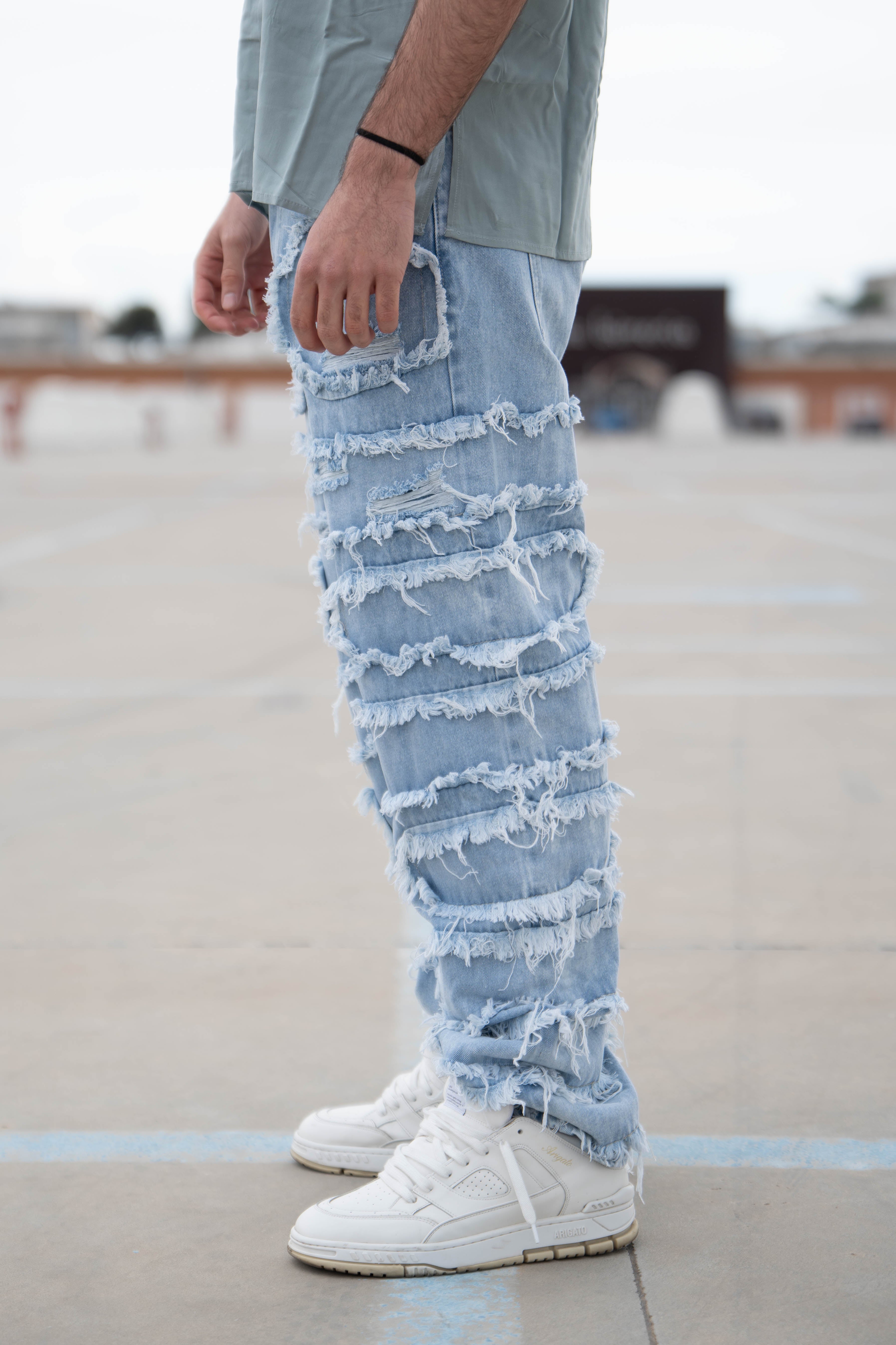 Jeans con frange