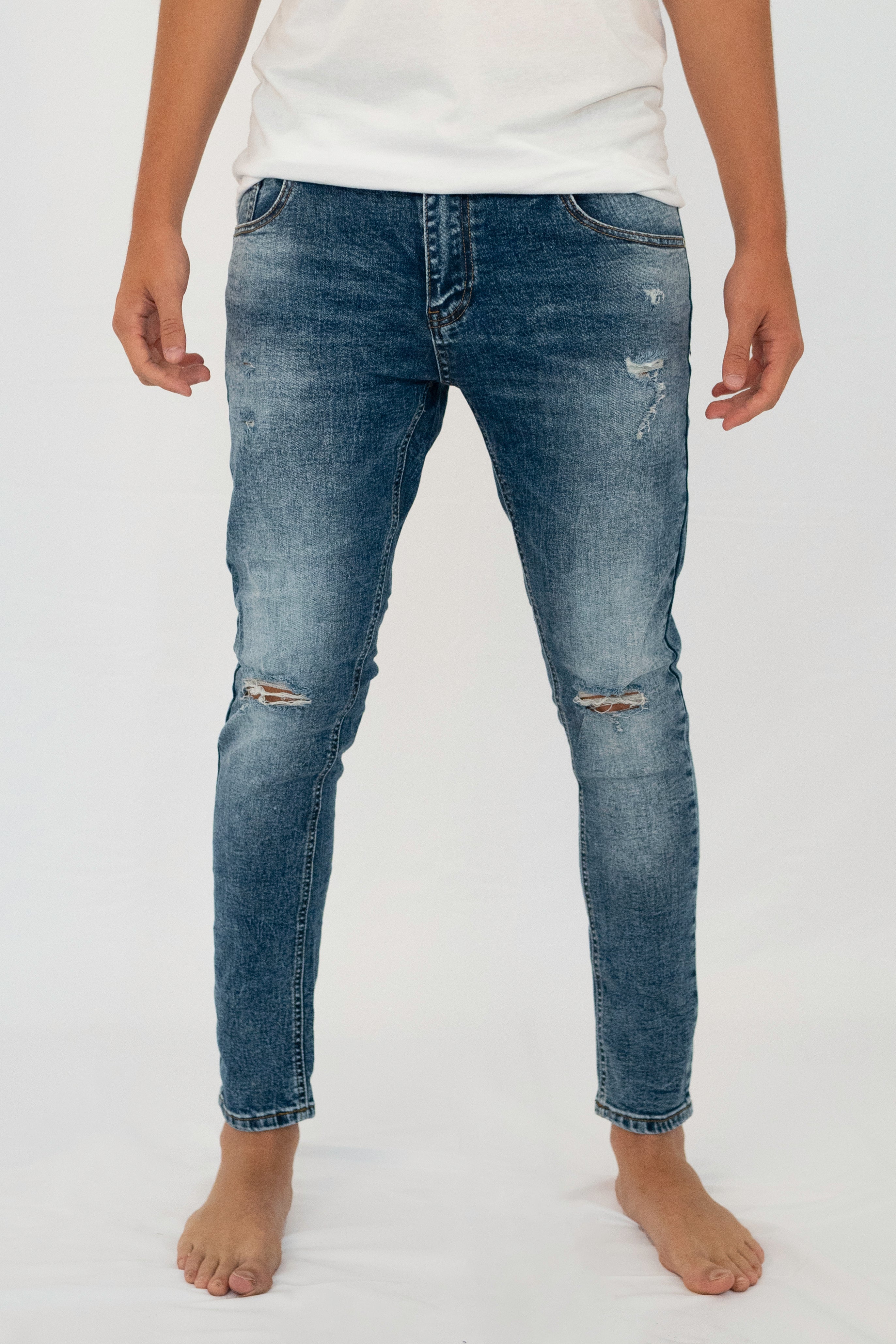 Jeans Slim Fit Con Rotture